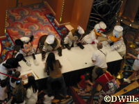 The characters hold an autograph session in the atrium.